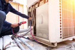 Plumber working on plumbing